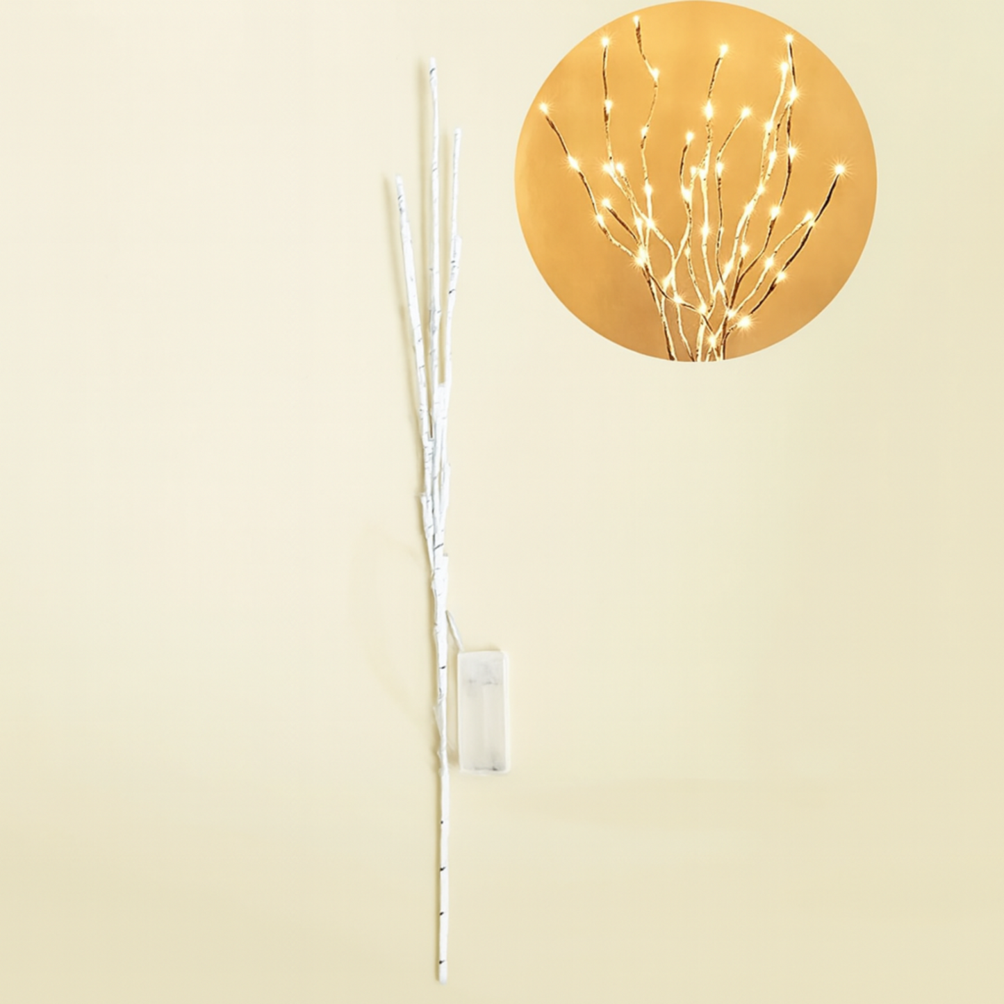 kruworld white birch LED branch light - Decorative battery operated twig lamp for home decorwall light fixture with LED branches on a beige wall.