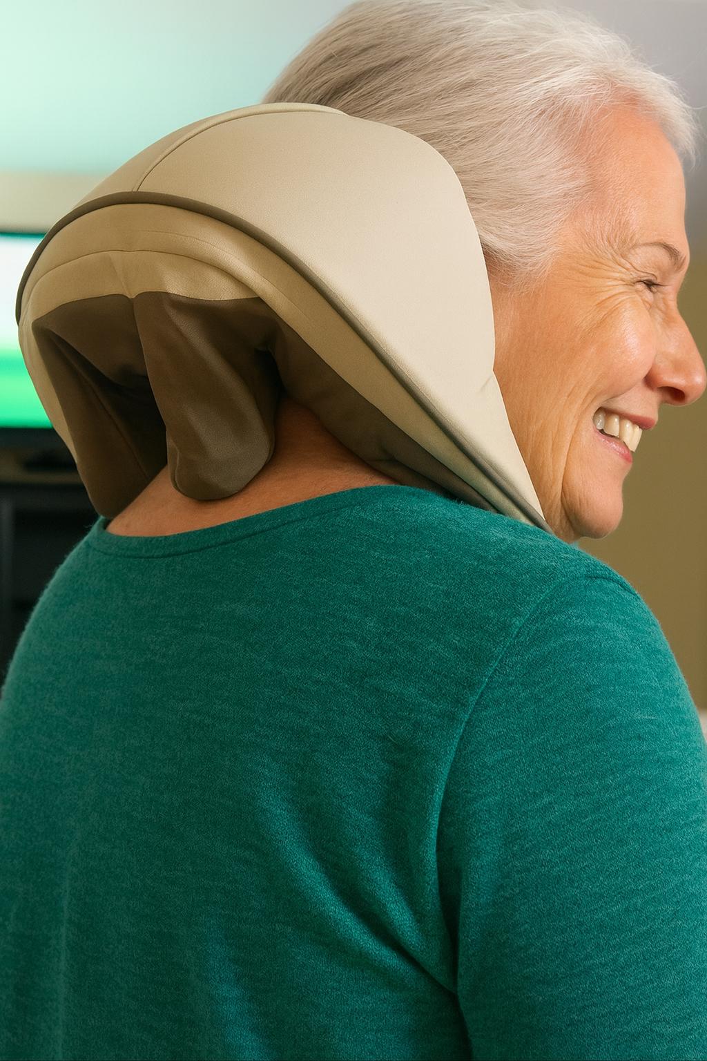 Person using a neck and shoulder massager with a blurred background