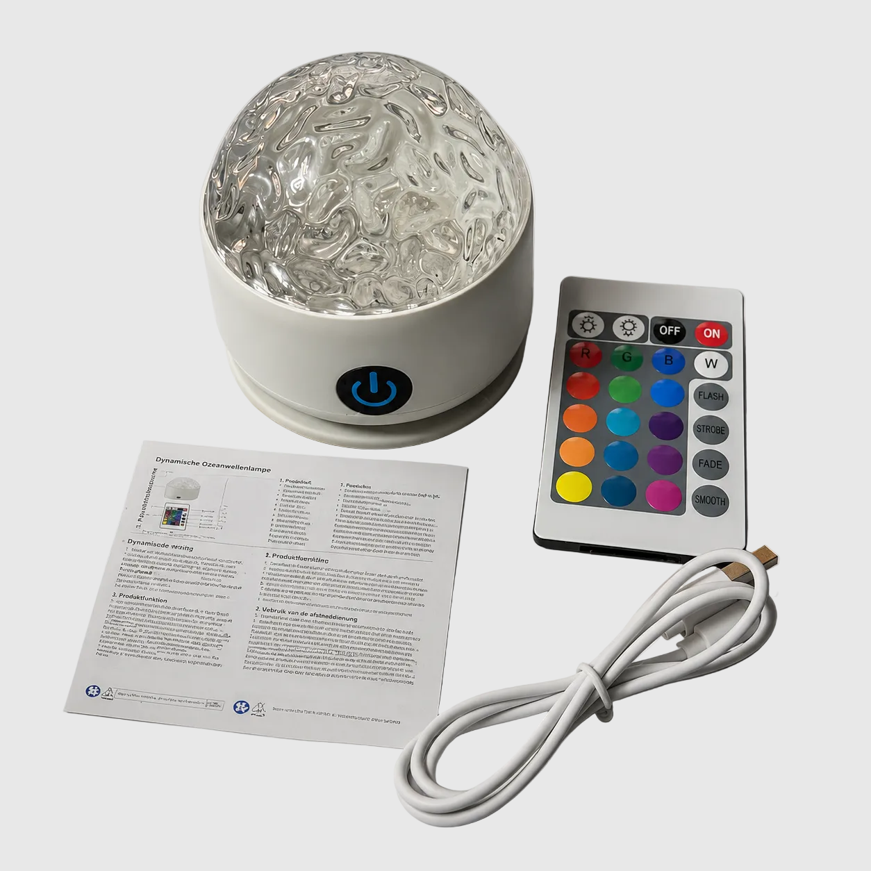 web design light with remote control and cable on a white surface 