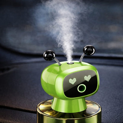 Green robot-shaped humidifier emitting mist on a dark background