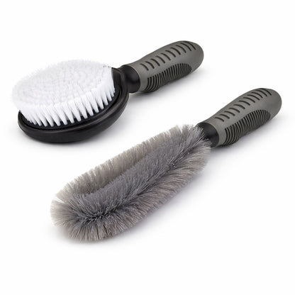 Two cleaning brushes with white bristles and gray bristles on a white background