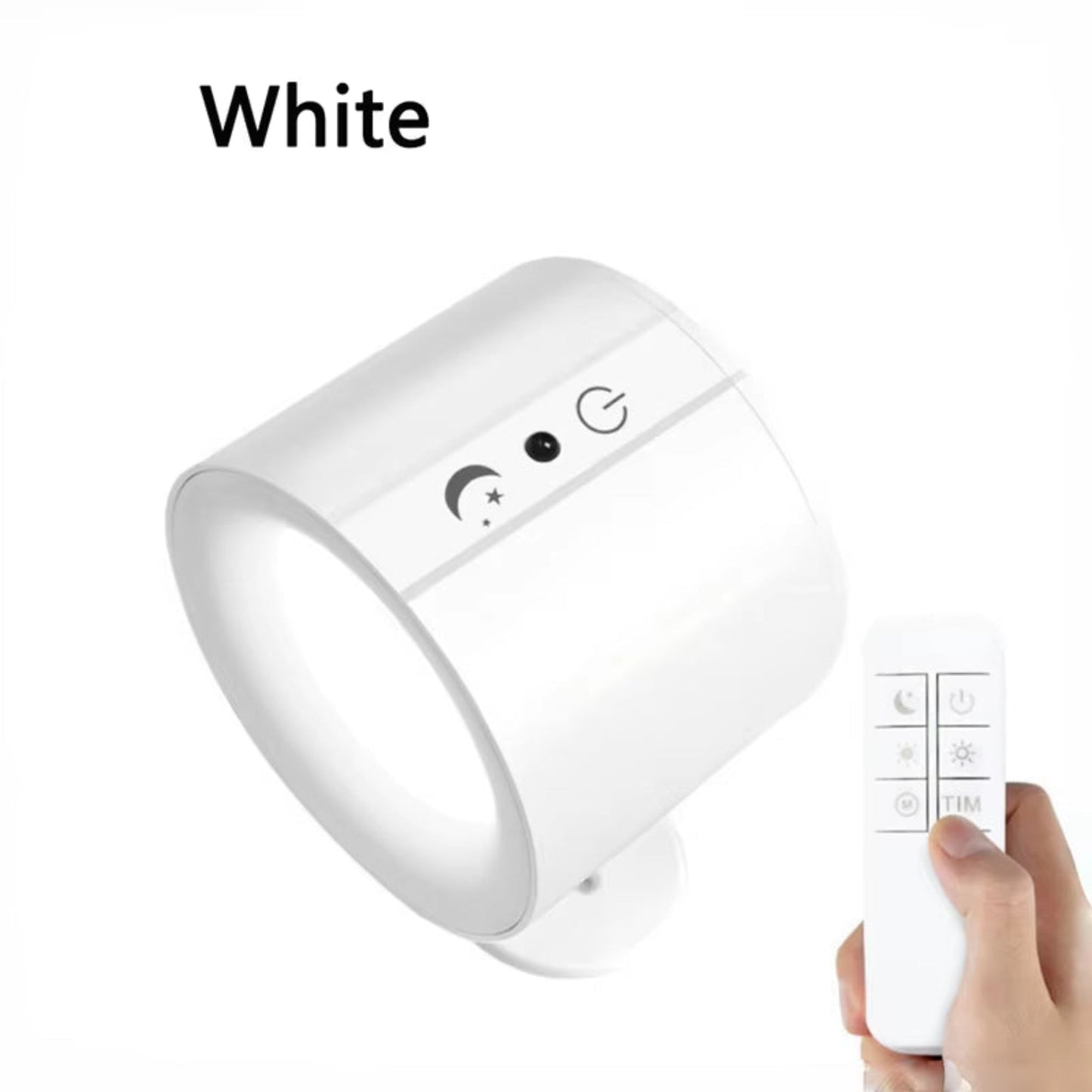 White night light with remote control held by a hand on a white background