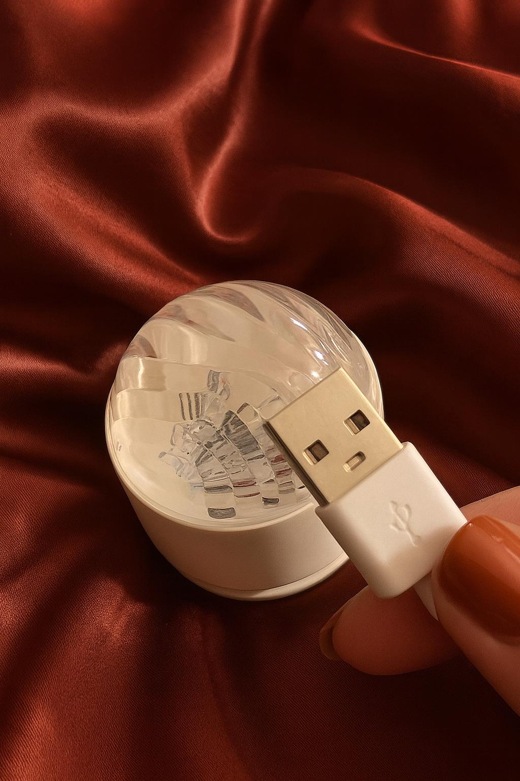USB light bulb on a brown fabric background