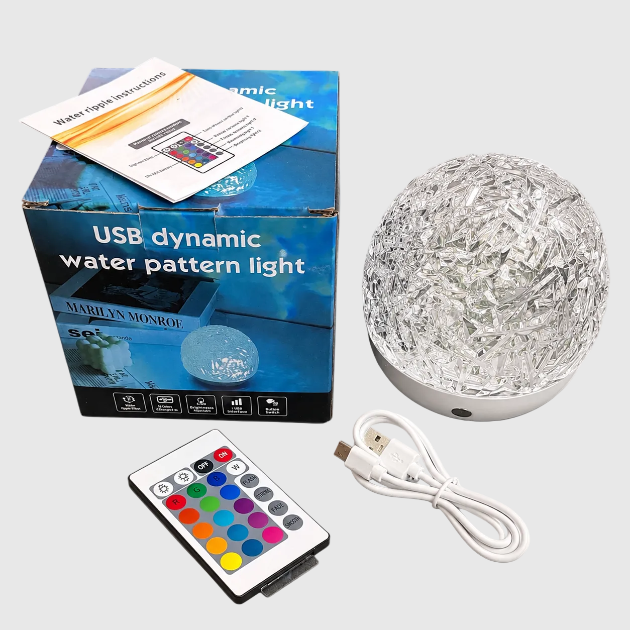 dome_aurora_galaxy USB dynamic water pattern light with packaging, remote control, and cable on a white background