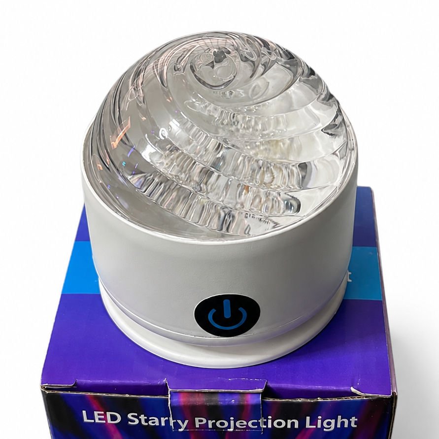 luminous_spiral LED starry projection light on its packaging with a white background