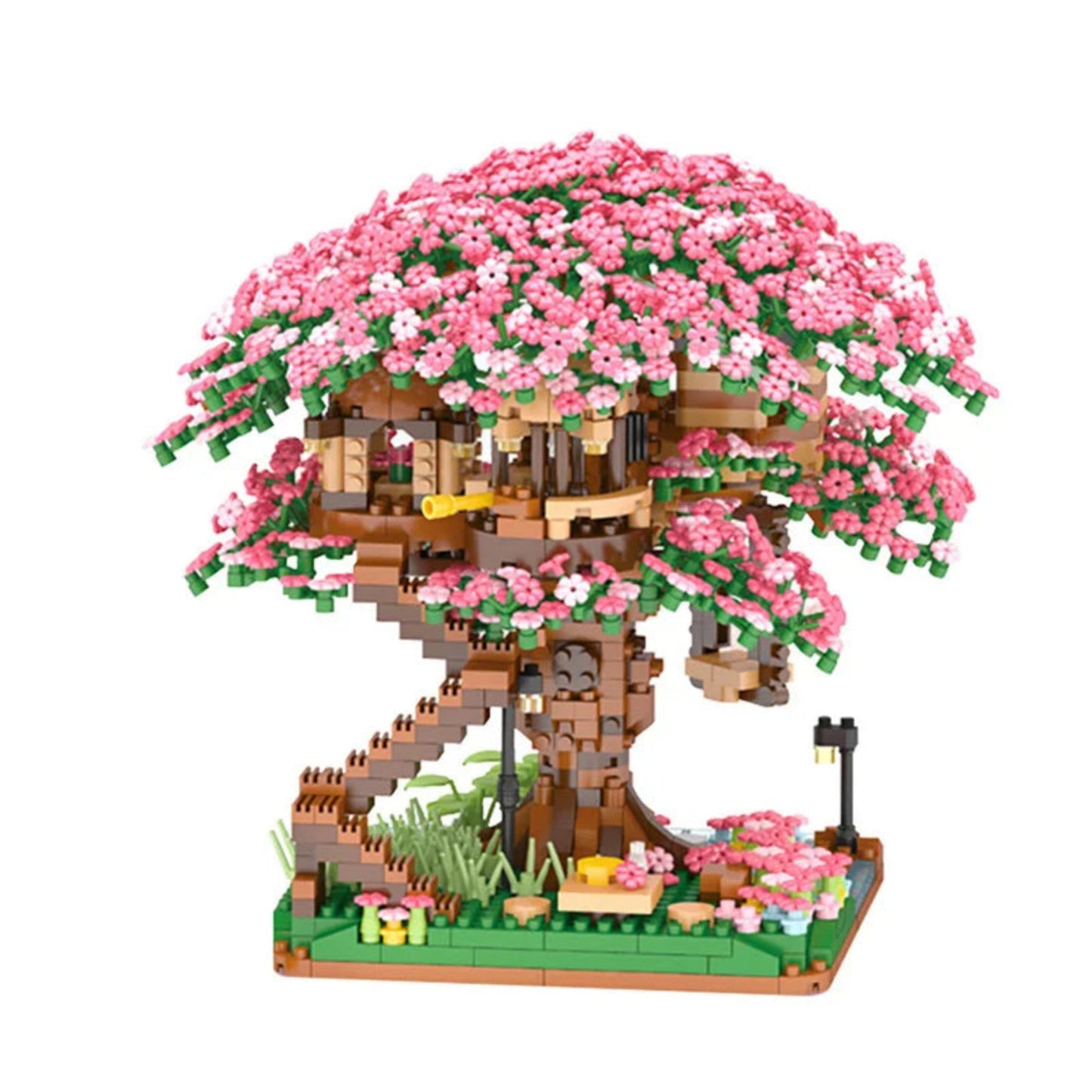 mini sakura treehouse with pink blossoms on a white background