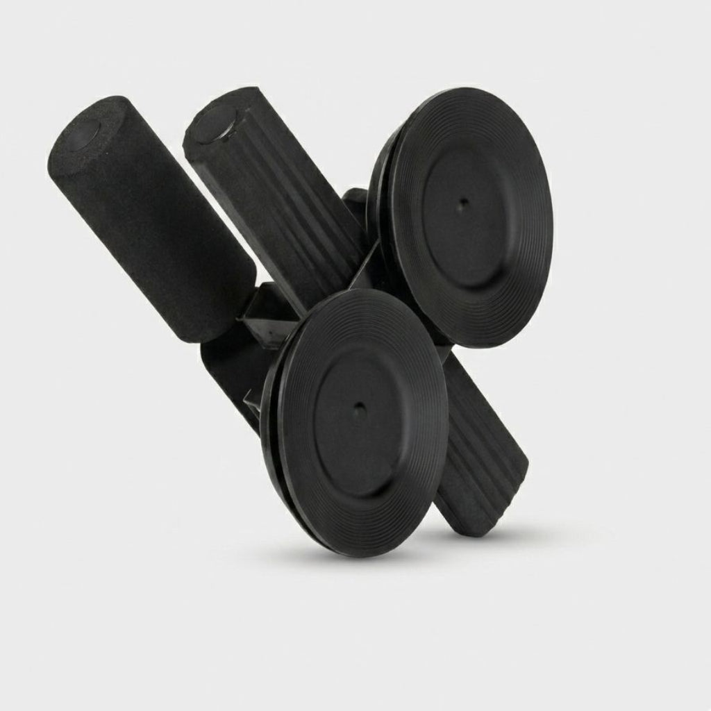 Black sit-up assistive device on a white background